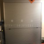 Locking motorized security shutter doors