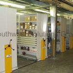 Maintenance sliding aisle track shelving storage