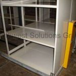 Mechanical assist compact shelving handles industrial storage racks