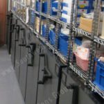 Mechanical assist high capacity storage cabinets
