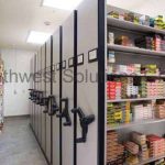Mechanical assist high density shelving ammo space saver mobile shelves