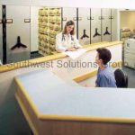 Mechanical assist high density storage mobile shelving system healthcare files