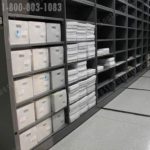 Metal shelving on eclipse powered mobile storage system for museum biology zoology sample storage