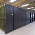 Military armory storage racks gsa weapon cabinets spacesaver high density rolling shelving