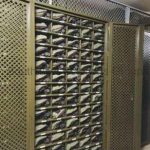 Military optical cabinet optic shelves racks on tracks gsa high density mobile storage shelving