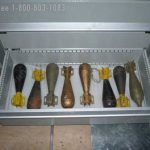 Military weapon bomb storage museum cabinet rack collection history artifact
