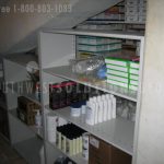 Miscellaneous supply storage on static shelving stair stepped