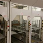 Motorized hospital gurney stretcher bed vertical storage