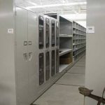 Museum cabinets on compact mobile bases shelving oversized collection