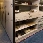 Museum compact track shelves drawers artifact racks