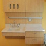 Neocase affinity exam room furniture casework millwork wall hanging sink storage off floor