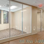 Office demountable glass walls on carpet tile