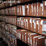 Open file room shelves with colored file labels numeric file labeling