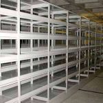 Open metal file shelves boxed document storage racks