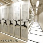 Open vertical shelves squeeze storage condensing