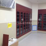 Operating room thermofoil cabinetry glass door storage shelves