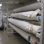 Oversized textile big large long rolled rack museum storage rug
