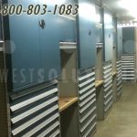 Parts storage drawers in shelving cabinets doors locking