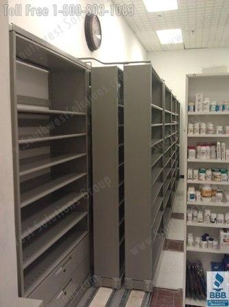 https://www.southwestsolutions.com/wp-content/uploads/2021/03/pharmacy-slider-high-density-medicine-storage-system-casework-modular.jpg