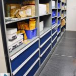 Police evidence property quartermaster storage shelving racks cabinets drawers in shelves organize space saving