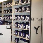 Rolling helmet storage equipment shelving