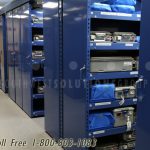 Shelving compact overhead track floating aisles storage