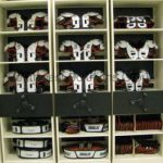 Shoulder pad gear storage football equipment shelves