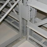 Side to side brackets installation highbay shelving book storage library facility
