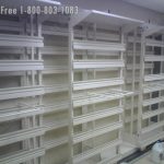 Sliding bin storage walls without plastic bin added high density moving shelves