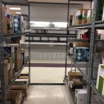 Sliding compact pallet racks mailroom package storage