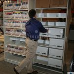 Sliding lateral shelving filing storage