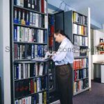 Sliding reference library book shelving