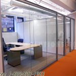 Solid framed frameless demountable glass wall systems