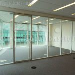 Solid framed frameless glass office walls