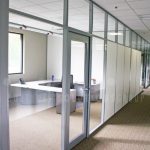 Solid glass framed frameless moveable walls