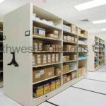 Spacesaver mechanical assist mobile storage stockroom shelves reduce save space