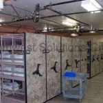 Spacesaver mechanical assist storage high density mobile shelving