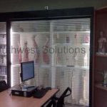 Specialty cabinets rollok clear slats doors