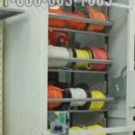 Spool storage carousel system for storing wire