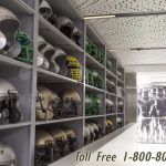 Sports equipment uniform gear storage shelving