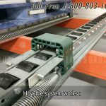 Spring rail push back pallet storage