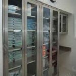 Stainless steel in wall cabinet glass doors sterile surgery supply procedural room storage