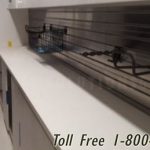 Stainless steel slat wall athletic equipment storage