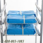 Storing packaged sterilized surgical kits on wire modular racks