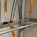 Tennis racket storage system shelving cabinet