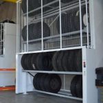 Tire rack carousel rotating high vertical storage