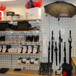 Umbrella hanging athletic gear storage shelving golf storage