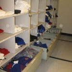Uniform storage drawers shelving equipment manager storage solutions