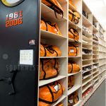 University football equipment room storage racks