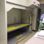 Vertical stacking motorized lift hospital bed crib storage